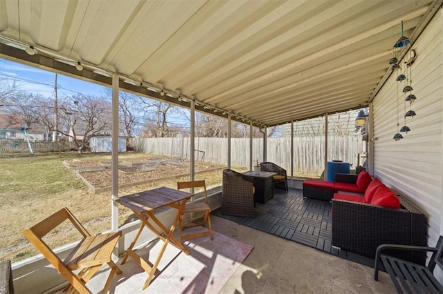 view of patio featuring an outdoor hangout area and a fenced backyard