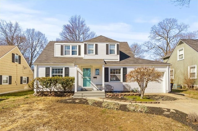 view of front facade featuring driveway and an attached garage