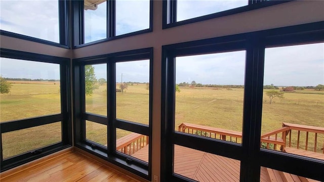 sunroom with a rural view