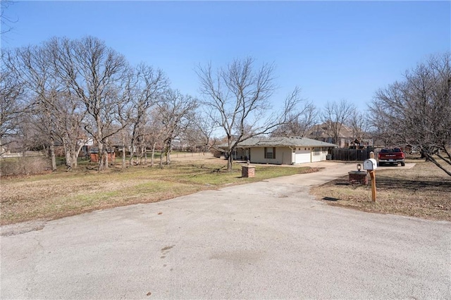 view of road featuring driveway