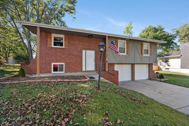 bi-level home with driveway, brick siding, an attached garage, and a front yard