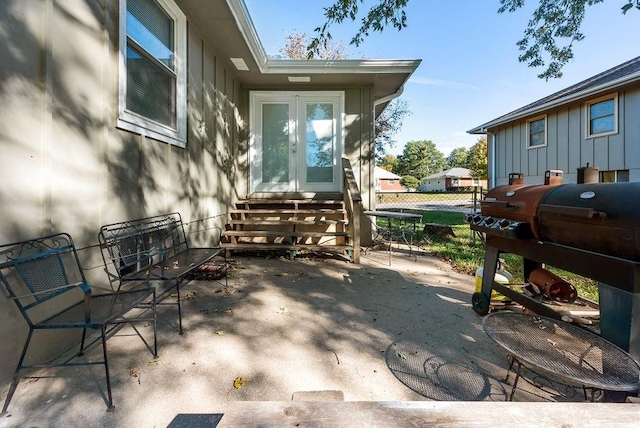 view of patio featuring entry steps, french doors, and grilling area