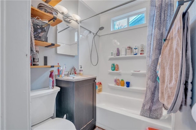 bathroom featuring vanity, toilet, and shower / bath combo with shower curtain