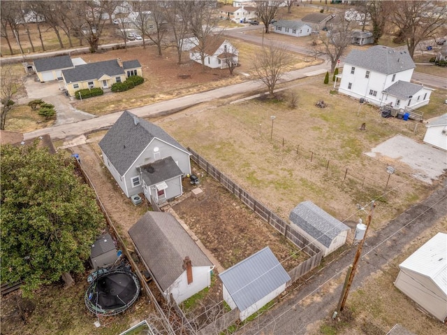 birds eye view of property with a residential view