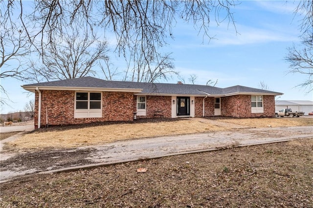 ranch-style home with brick siding