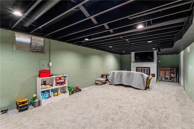 interior space with a fireplace and carpet