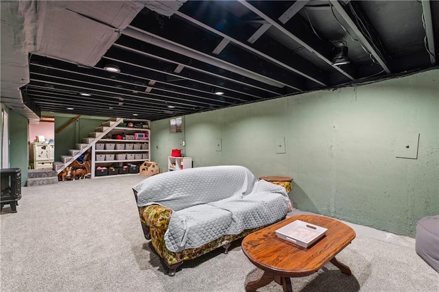 interior space with stairway and carpet