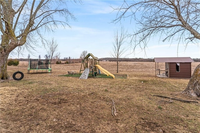 view of jungle gym featuring an outdoor structure and a trampoline