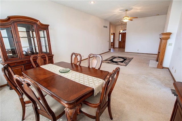 22513 E 33rd St S, Blue Springs, MO 64015 - dining space with ceiling fan, baseboards, and light carpet