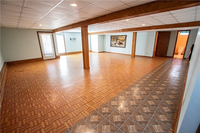 22513 E 33rd St S, Blue Springs, MO 64015 - basement with a paneled ceiling and baseboards