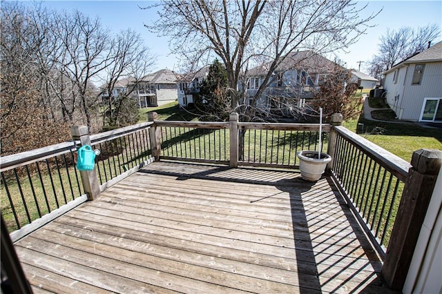 22513 E 33rd St S, Blue Springs, MO 64015 - wooden deck featuring a yard and a residential view