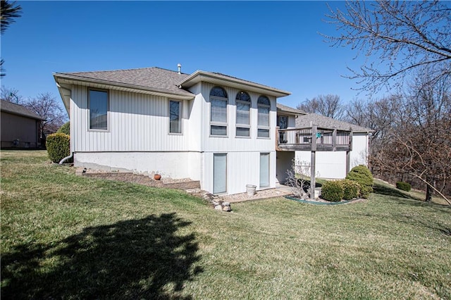 22513 E 33rd St S, Blue Springs, MO 64015 - rear view of house with a lawn and a shingled roof