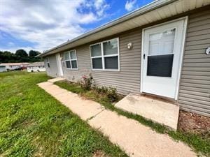 18822 E Wigwam Dr, Independence, MO 64056 - view of exterior entry with a lawn