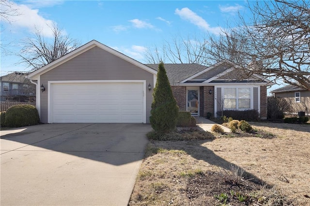 ranch-style house featuring brick siding, driveway, an attached garage, and a shingled roof