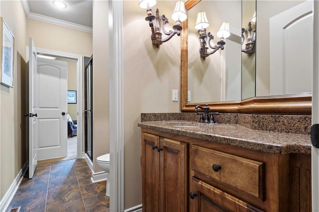 full bathroom featuring vanity, a stall shower, a textured ceiling, crown molding, and toilet