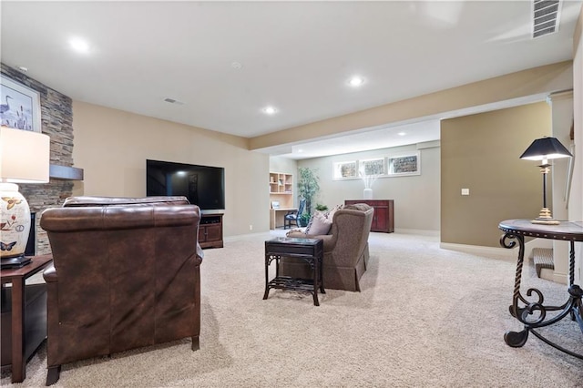 carpeted living room featuring recessed lighting, visible vents, and baseboards