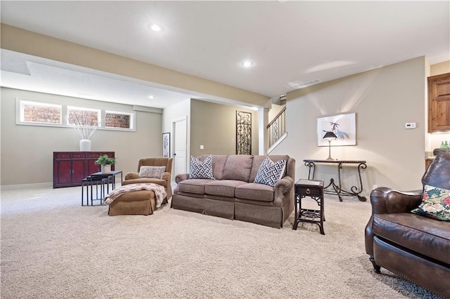 living area featuring recessed lighting, baseboards, and carpet floors