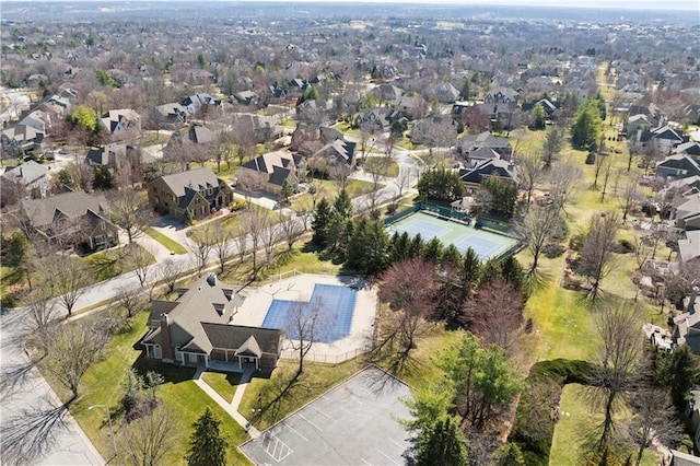 birds eye view of property with a residential view