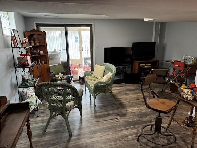 living area with wood finished floors