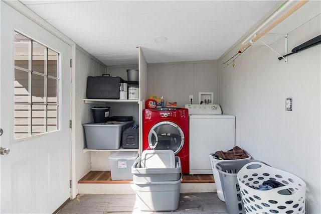 laundry room featuring washer and dryer and laundry area