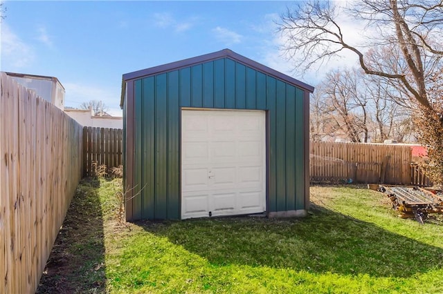 garage with fence