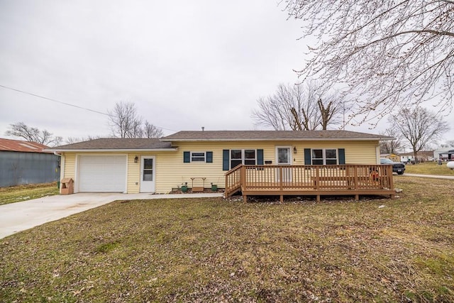 ranch-style home with a garage, a front yard, a wooden deck, and driveway