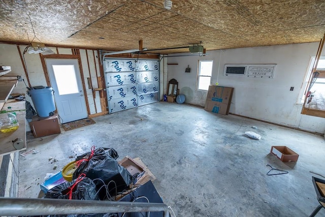 interior space featuring concrete floors and a garage