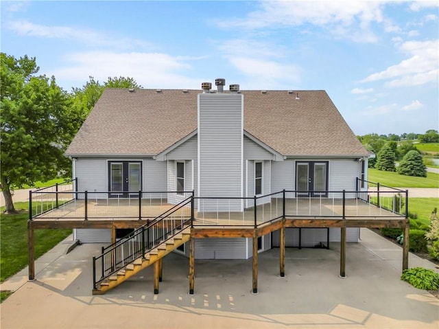 1796 NW 770th Rd, Bates City, MO 64011 - rear view of property featuring french doors, a wooden deck, a chimney, and stairway