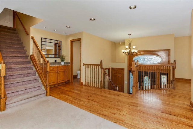 1796 NW 770th Rd, Bates City, MO 64011 - foyer entrance with light wood-style floors, a chandelier, baseboards, and recessed lighting