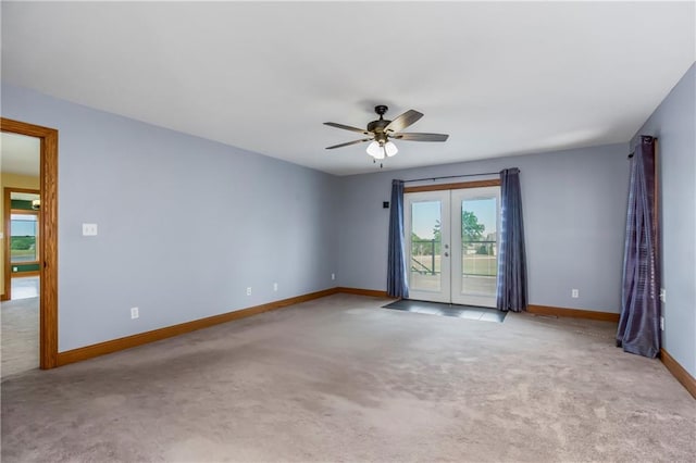 1796 NW 770th Rd, Bates City, MO 64011 - empty room with carpet flooring, french doors, baseboards, and ceiling fan