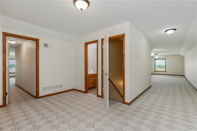 1796 NW 770th Rd, Bates City, MO 64011 - spare room featuring light colored carpet, baseboards, ceiling fan, and lofted ceiling