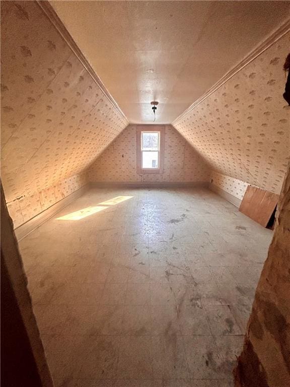 bonus room featuring lofted ceiling