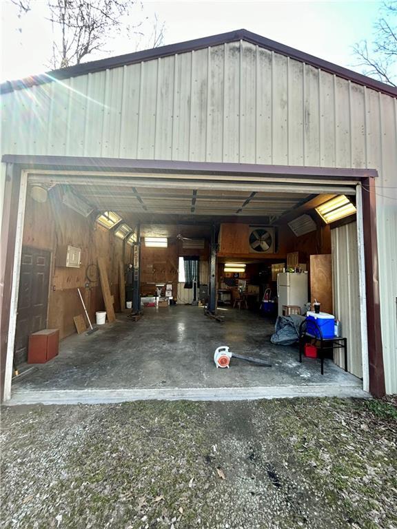 garage with freestanding refrigerator