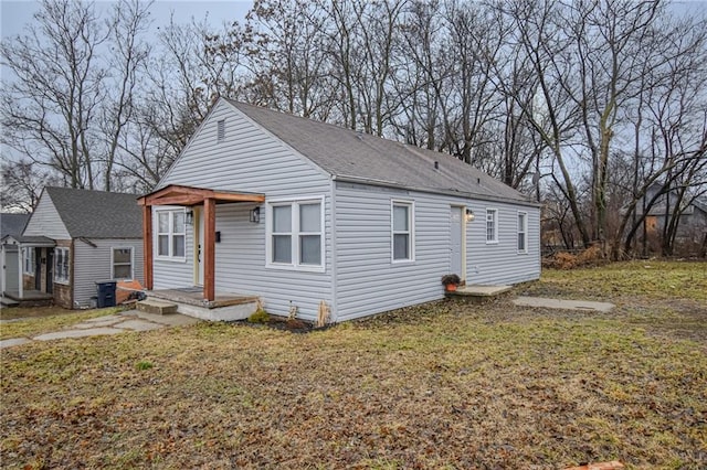 bungalow with a front yard