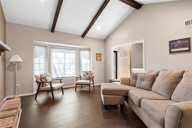 living area featuring dark wood finished floors, beam ceiling, and baseboards