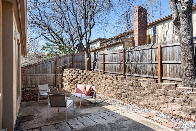 view of patio with a fenced backyard