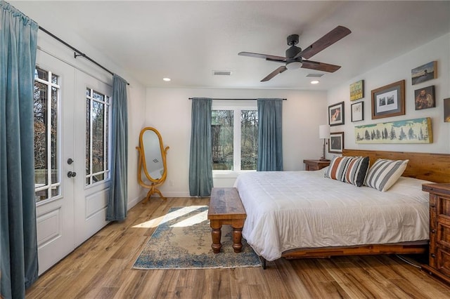 bedroom with visible vents, recessed lighting, a ceiling fan, and wood finished floors