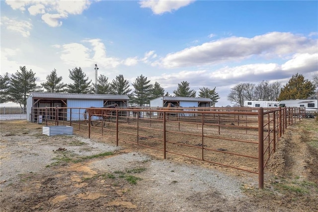 view of yard featuring an exterior structure and an outbuilding