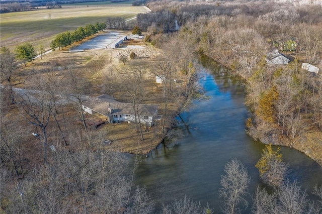 drone / aerial view featuring a rural view and a water view