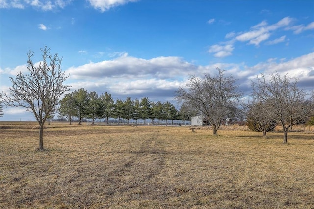 350 NW 71p Rd, Clinton, MO 64735 - view of yard featuring fence, an outbuilding, and a rural view