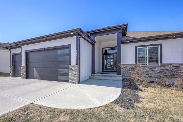 view of front of property featuring stone siding and a garage