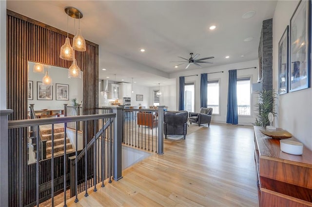 interior space featuring recessed lighting, wood finished floors, and a ceiling fan