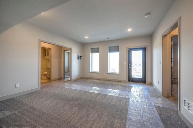 entryway with visible vents, recessed lighting, and baseboards