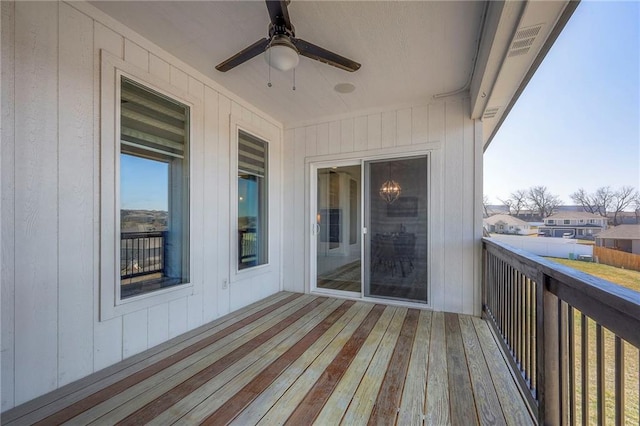 wooden deck with ceiling fan