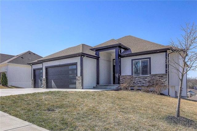 view of front of house with a front yard, an attached garage, stone siding, and driveway