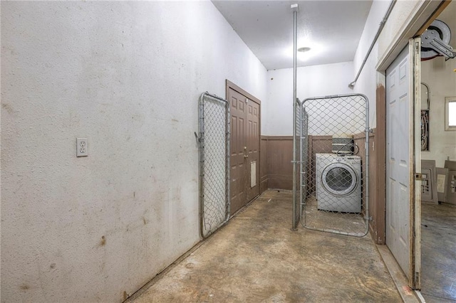 laundry room with laundry area and washer / dryer