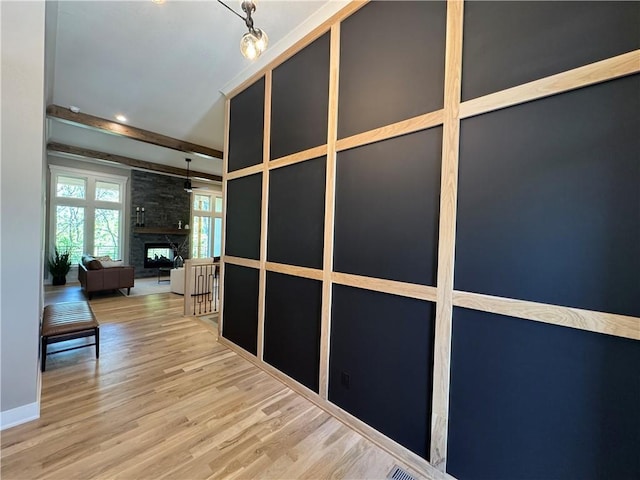 hall with recessed lighting and wood finished floors