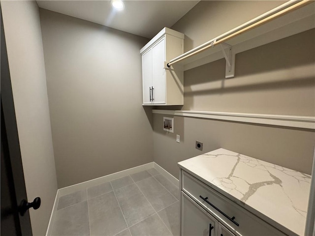 washroom featuring electric dryer hookup, cabinet space, baseboards, hookup for a washing machine, and recessed lighting