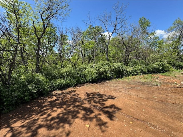 view of landscape with a view of trees