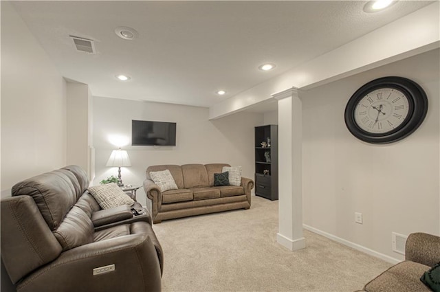 living room featuring recessed lighting, visible vents, baseboards, and light colored carpet